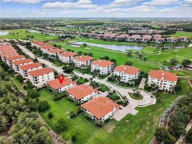 Bird's eye view of a golf course, a large body of