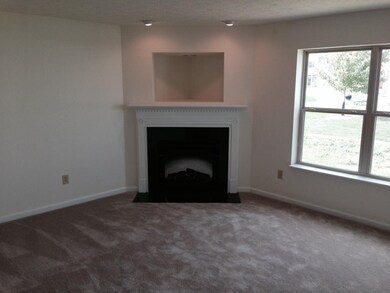 Enjoy your cozy Hearth Room with fireplace located