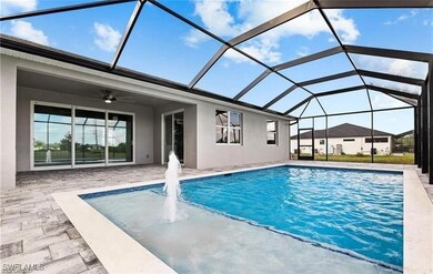 Swimming pool featuring a patio, a ceiling fan, an