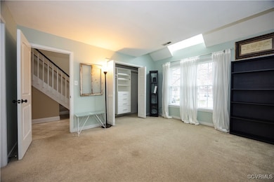 First floor bedroom with closet organizer and full