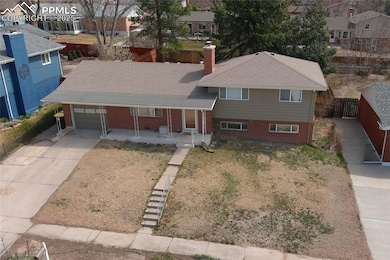 View of front of property with concrete driveway, 
