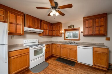 Custom cabinets, new counter tops and original har