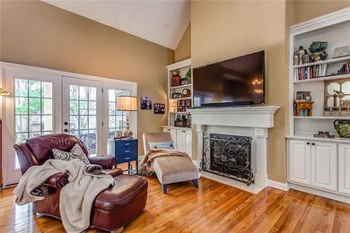 BUILT-IN BOOKCASES, GAS LOG FIREPLACE, & 2 DOORS T