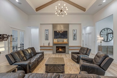 This inviting living room features high ceilings w