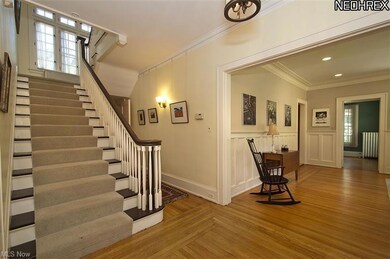 Elegant open foyer and stairway.