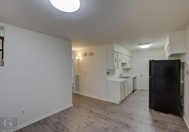 Dining room open to kitchen and covered patio.