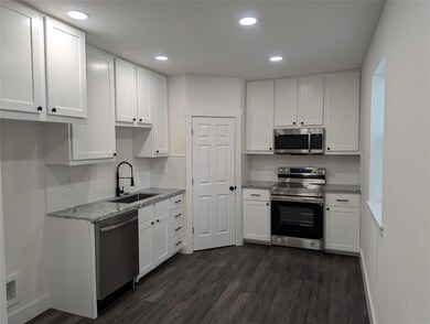 Living room featuring luxury vinyl flooring