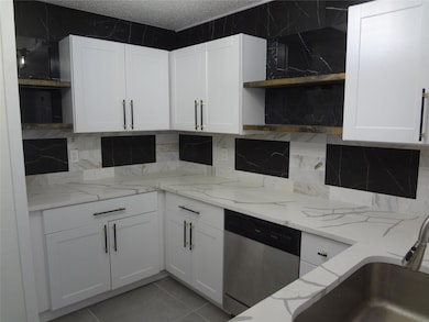 Cabinets galore for storage.