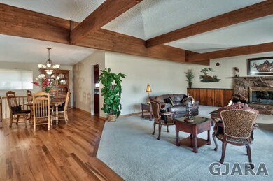 The spacious living room gives way to a formal din