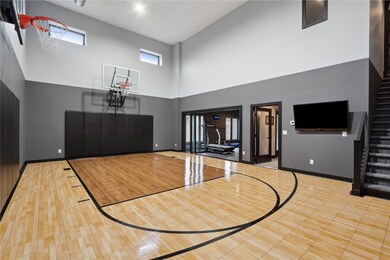 Retractable glass doors open up to your workout ro