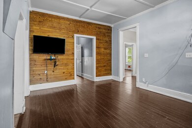 Great room boasts lots of natural beauty and light