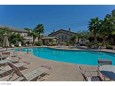 Community pool featuring a patio area