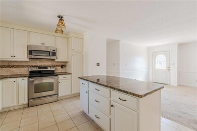 Kitchen with stainless steel appliances, tasteful 