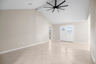 The entry way leads to the large living room with