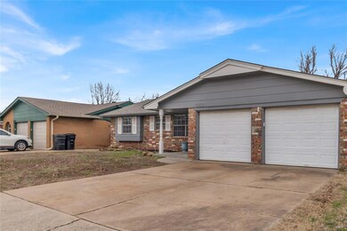 Ranch-style house featuring a garage