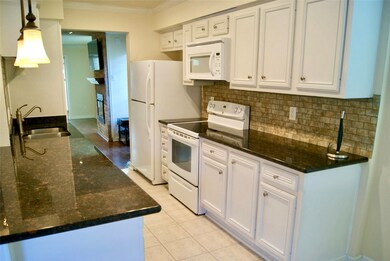 Gleaming kitchen with granite countertops