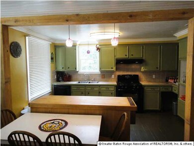 KITCHEN IS OPEN TO LIVING ROOM
