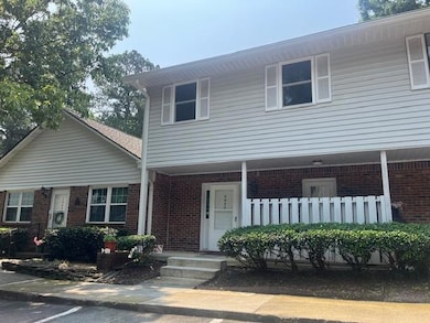 View of front of home with brick siding