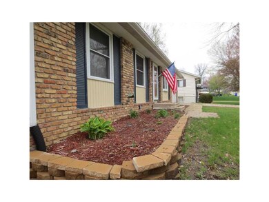 Front Exterior. Landscaping and border block give 