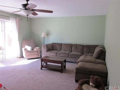 Living room with dual panned slider to patio area.