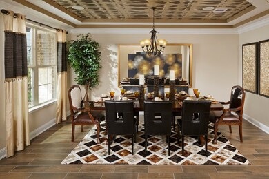 **Home is Under Construction. The photo shown here is of a completed home that has the same floor plan and similar elevation. Options and color selections may vary.**