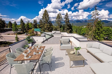 View of patio / terrace with outdoor lounge area, outdoor dining space, and a mountain view