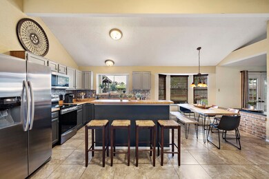 Inviting chef island kitchen with pull-up breakfast bar