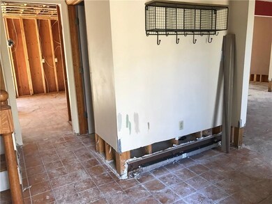 Entryway. Kitchen straight...