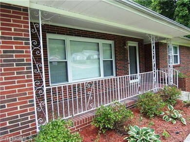 Exterior Front. True rocking chair front porch