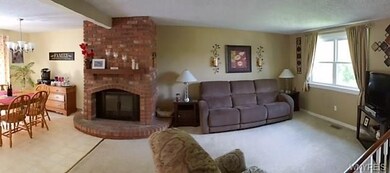 Living room ..with wood burning fireplace to enjoy