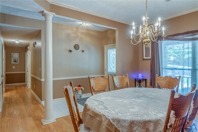Lovely wood floors flow from the Dining Room down