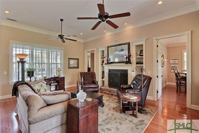 Open to the foyer and dining room, the family room