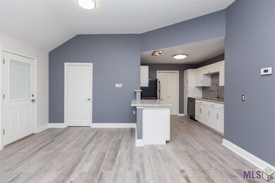 Living Room with view of kitchen