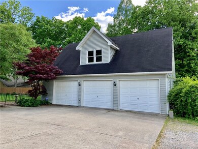 3 car detached garage.