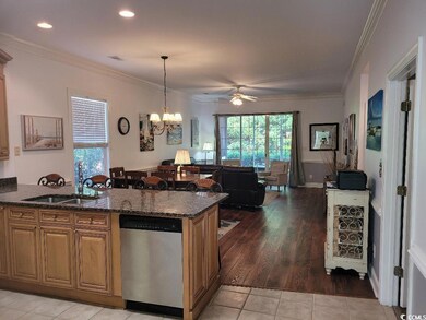 Kitchen with dining area and chandelier, LVT floor