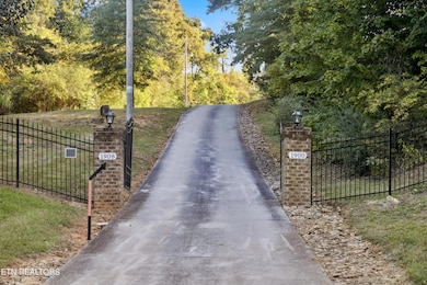 GATED WITH CONCRETE DRIVEWAY