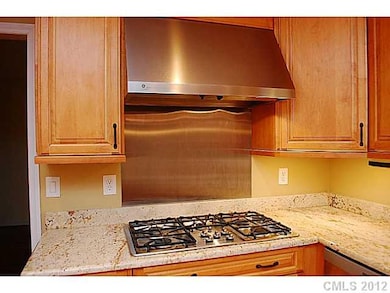 Exterior Front - Gas Kitchen range with vented hoo