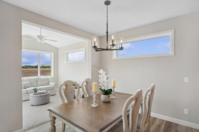 Dining Area - image is of a former model home for visual purposes.