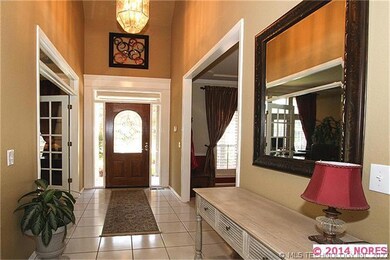The formal dining room and office sit on either si