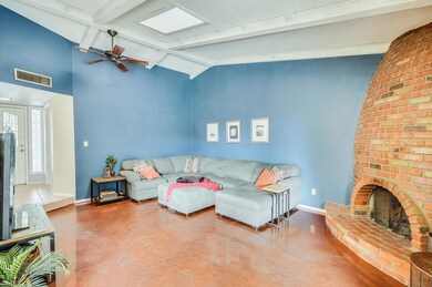Entry, fireplace & kitchen