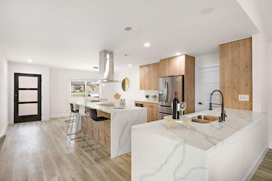Kitchen with stainless steel fridge, modern cabin