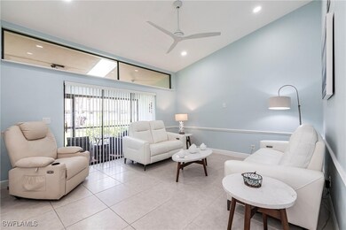 Living area featuring light tile patterned floors,
