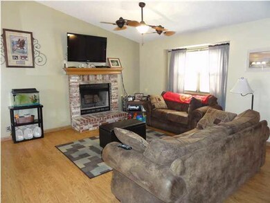 Wood burning fireplace and large picture window!