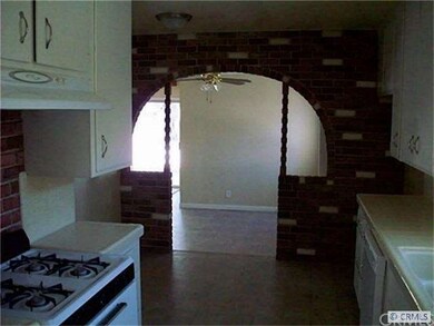 Looking from the kitchen into the family room