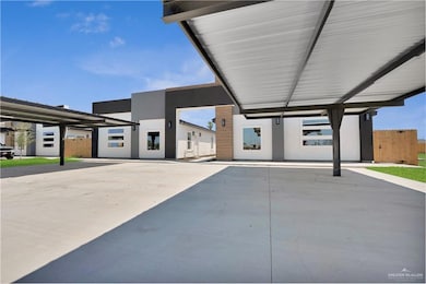 View of patio with fence