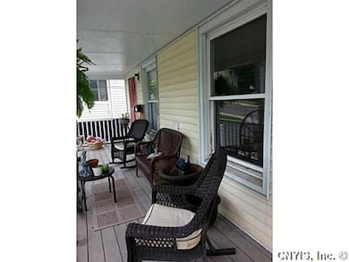 Exterior Front. Great porch for relaxing on the qu
