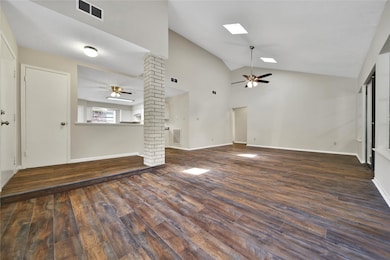 Bright and spacious living room with updated floor