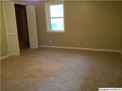 Master bedroom has new carpet and paint.