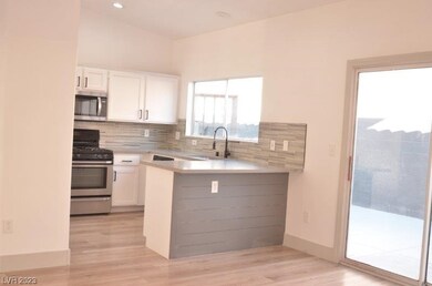 2690 Holy Cross Dr, Las Vegas, NV 89156 - photo 7