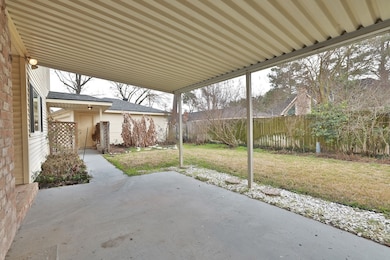 Step outside to enjoy a covered outdoor living spa